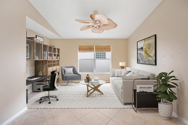 tiled office space featuring ceiling fan and vaulted ceiling