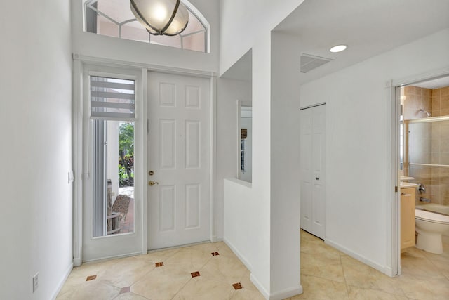 view of tiled foyer entrance