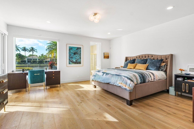 bedroom featuring light wood-type flooring