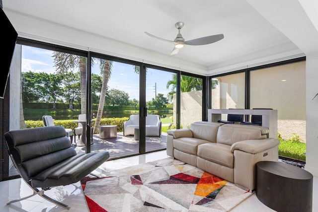 sunroom with ceiling fan