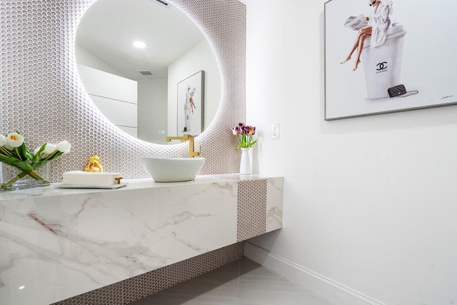 interior space featuring tile patterned floors and sink