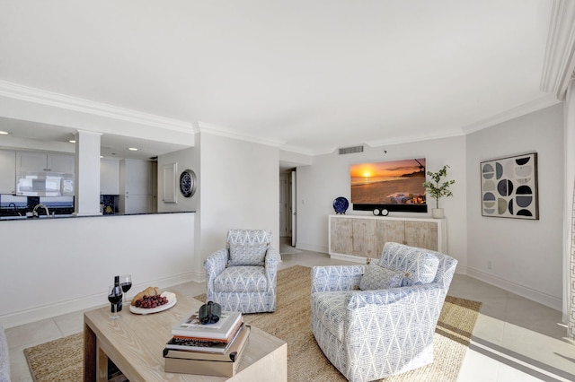 living room with crown molding and light tile patterned flooring