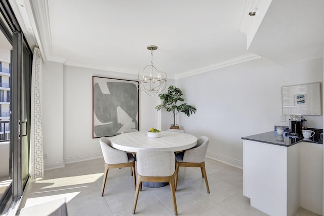 tiled dining area featuring ornamental molding and a chandelier