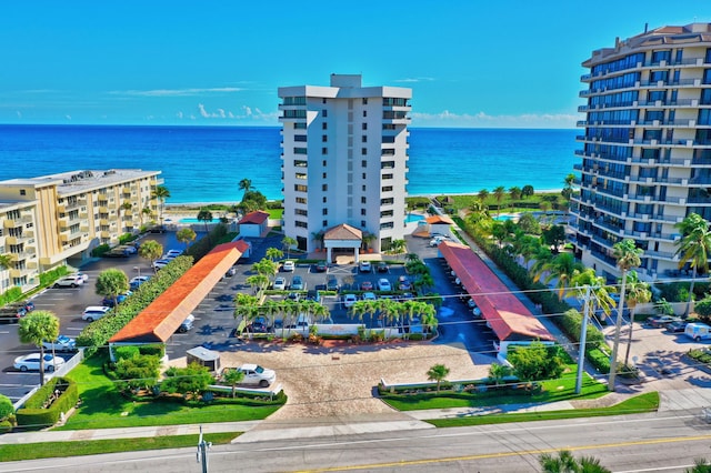 drone / aerial view with a water view