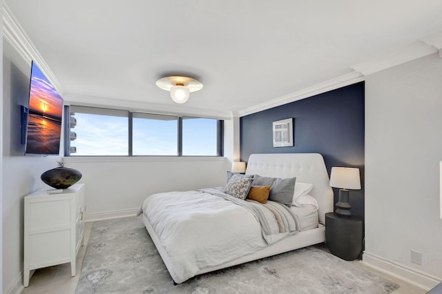 bedroom with crown molding