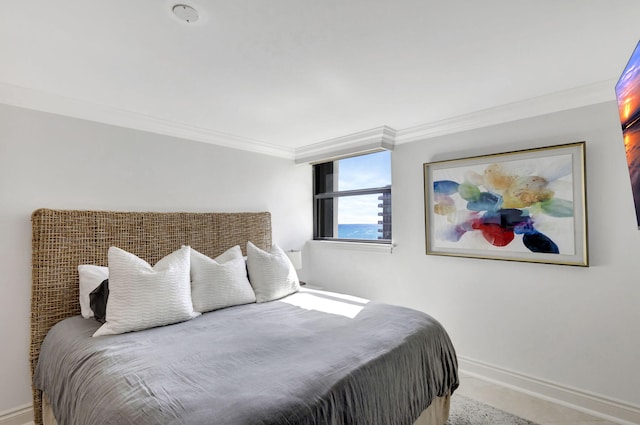 bedroom featuring crown molding and carpet flooring