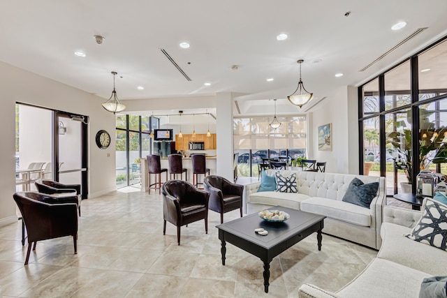 living room featuring light tile patterned floors