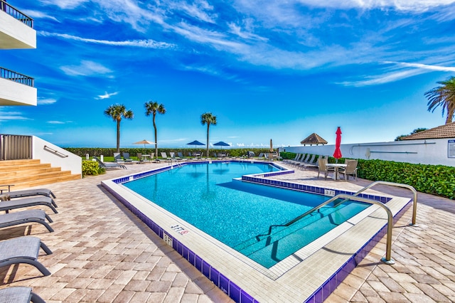 view of pool with a patio area