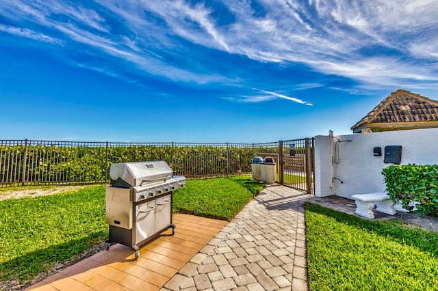 view of patio featuring a grill