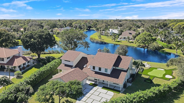 drone / aerial view with a water view