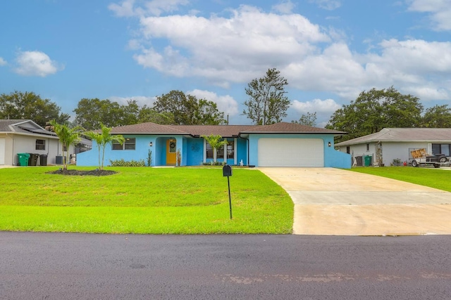 ranch-style house with a front yard and a garage