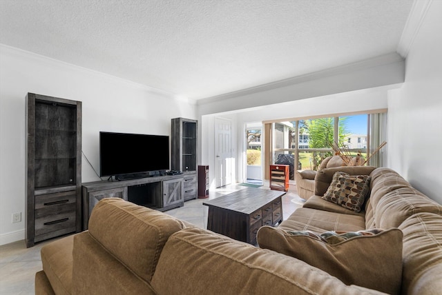 living room featuring light tile patterned floors, a textured ceiling, and crown molding