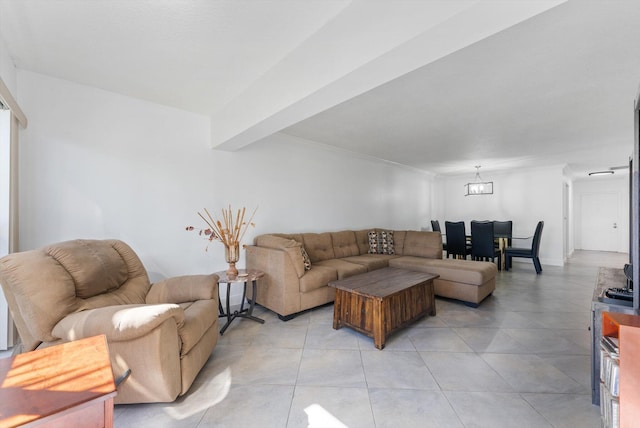 tiled living room with a chandelier