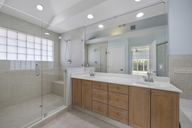 bathroom featuring ceiling fan, tile patterned flooring, vanity, and an enclosed shower