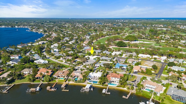 drone / aerial view with a water view