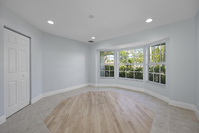 view of tiled spare room