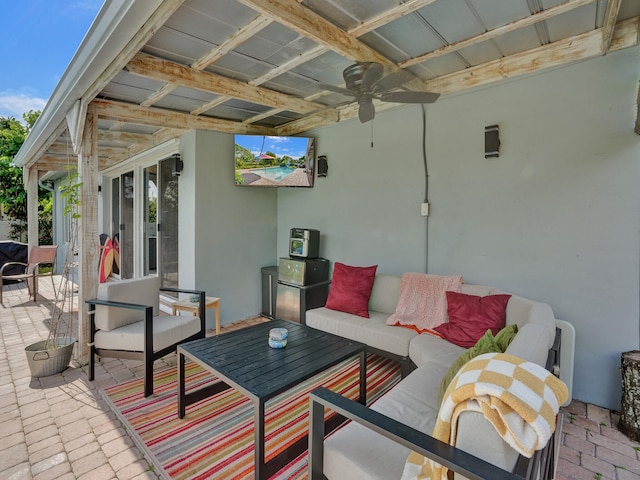 view of patio / terrace with ceiling fan, french doors, and an outdoor living space