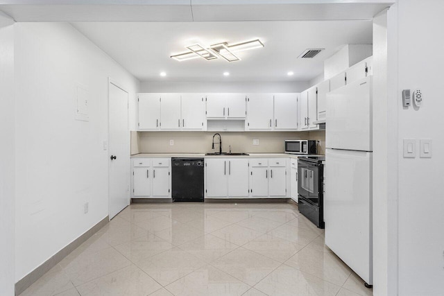 kitchen with black appliances, light tile patterned flooring, white cabinetry, and sink