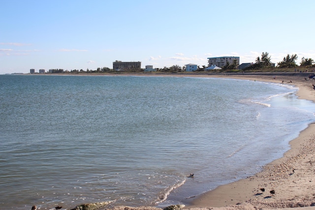 property view of water featuring a view of the beach