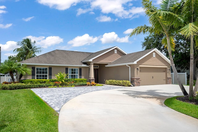 ranch-style house featuring a garage