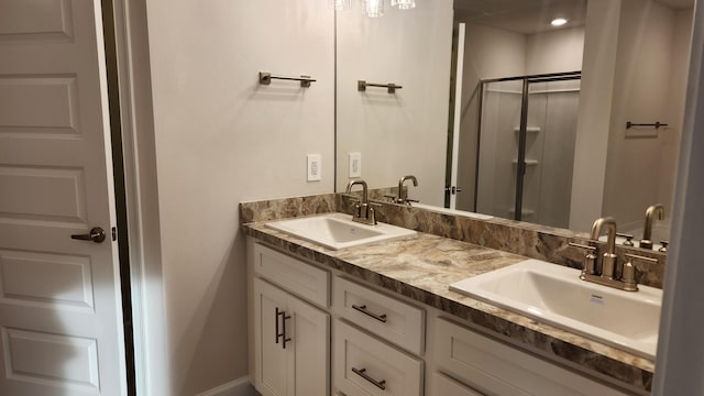 206 Riomar Dr, Port Saint Lucie, FL 34952 - full bath featuring double vanity, a stall shower, and a sink
