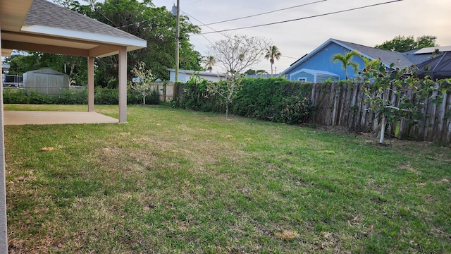 206 Riomar Dr, Port Saint Lucie, FL 34952 - view of yard with a patio and fence