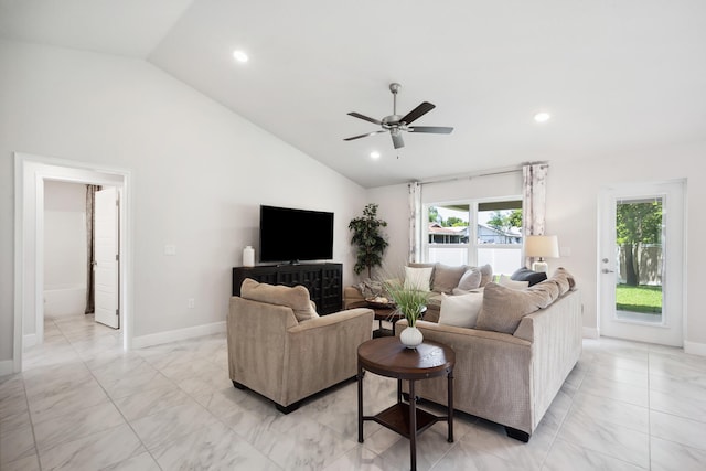 living room featuring ceiling fan and high vaulted ceiling