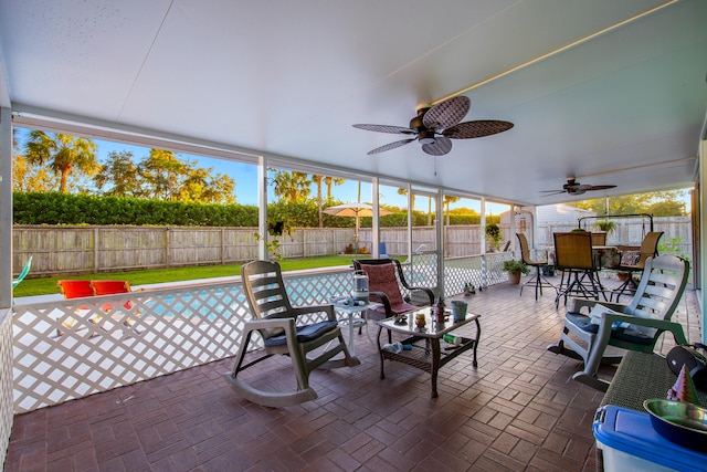 view of patio featuring ceiling fan