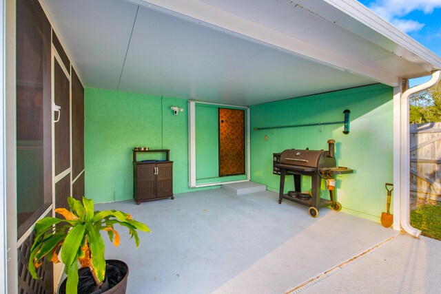 view of pool featuring a yard, a patio area, a fire pit, and a sunroom