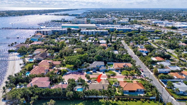 birds eye view of property featuring a water view