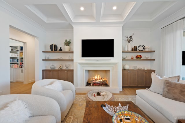 living room with coffered ceiling, ornamental molding, beam ceiling, and light hardwood / wood-style floors