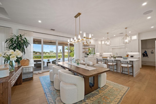 dining space featuring light hardwood / wood-style floors