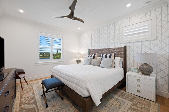 bathroom featuring crown molding, vanity, shower with separate bathtub, and tile walls