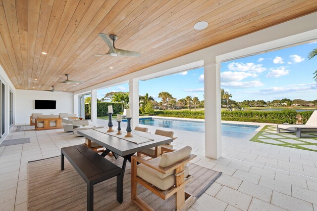 view of patio featuring ceiling fan