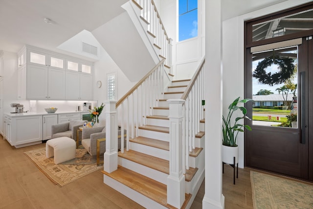 entryway with light hardwood / wood-style floors