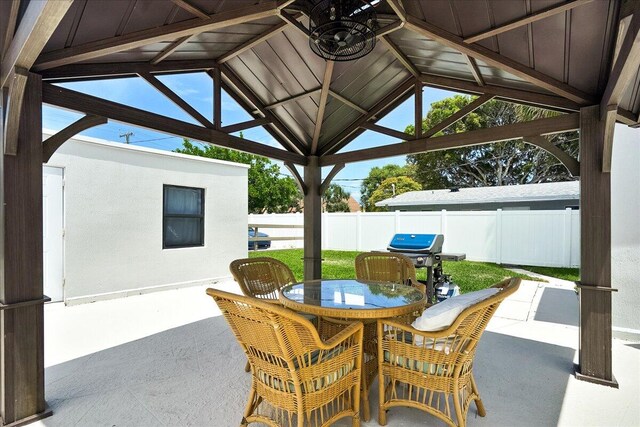 view of patio / terrace featuring a gazebo and area for grilling