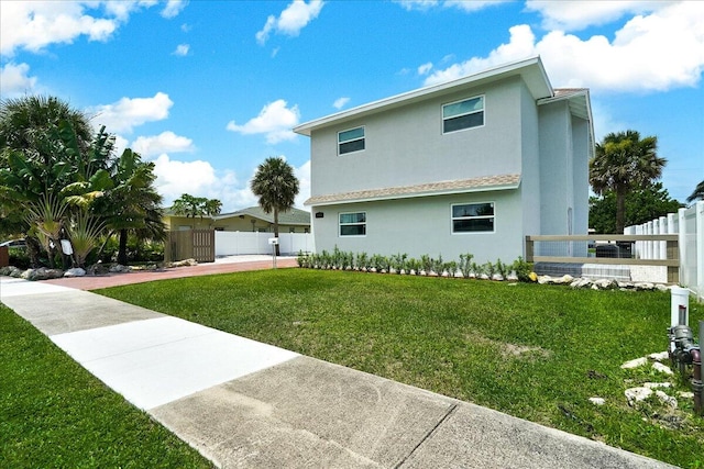 exterior space featuring a lawn