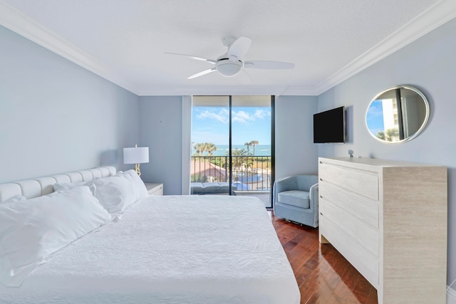 bedroom with access to outside, ceiling fan, crown molding, a wall of windows, and dark hardwood / wood-style floors