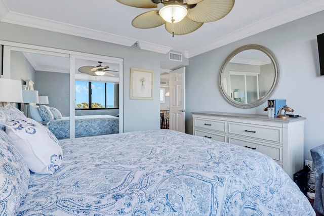 bedroom with ceiling fan and crown molding