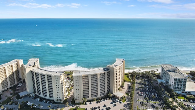 bird's eye view with a beach view and a water view