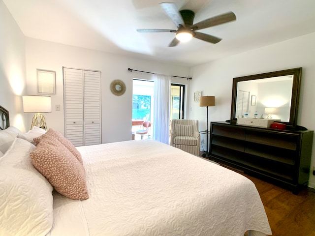 bedroom featuring ceiling fan and dark hardwood / wood-style flooring