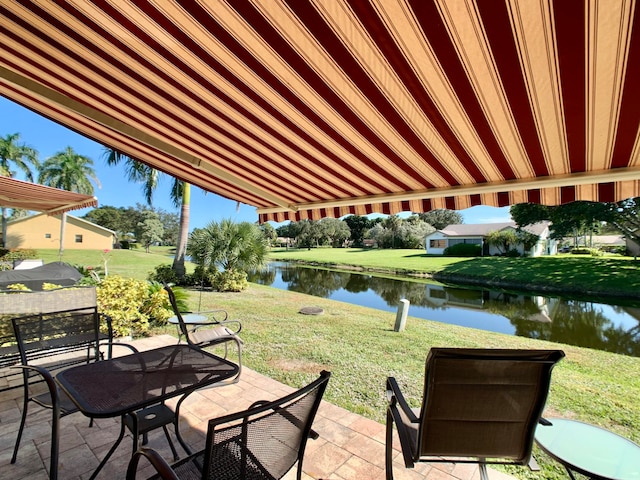 view of patio / terrace with a water view