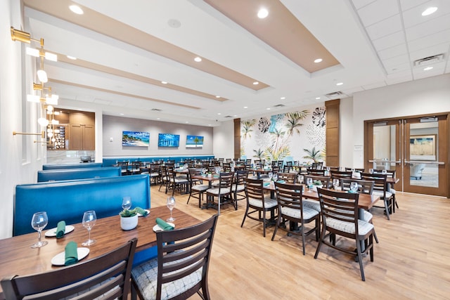 dining room with light hardwood / wood-style flooring