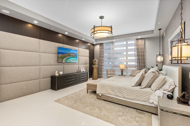 bedroom featuring concrete flooring