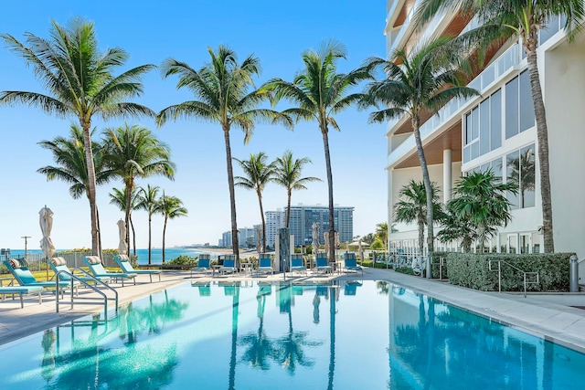 view of swimming pool with a patio