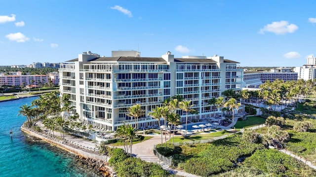 view of building exterior with a water view