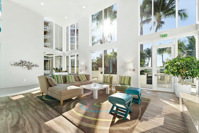 sunroom with a wealth of natural light and french doors