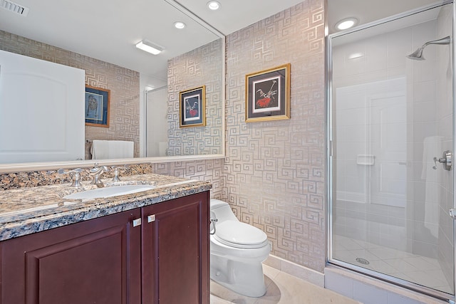 full bathroom with toilet, vanity, visible vents, tile patterned floors, and a stall shower