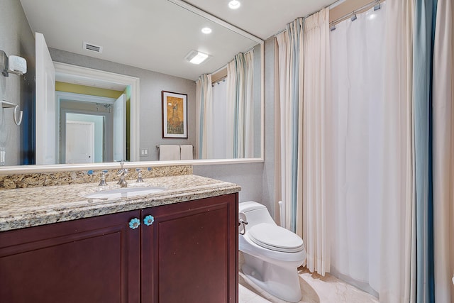 full bathroom with toilet, recessed lighting, visible vents, and vanity