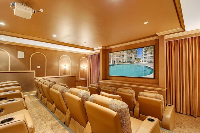 home theater with ornamental molding, recessed lighting, and light colored carpet